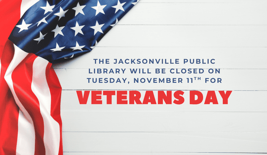 Image: a white wooden background with an American flag to the left side. Text reads: The Jacksonville Public Library will be closed on Tuesday, November 11th for Veterans Day.